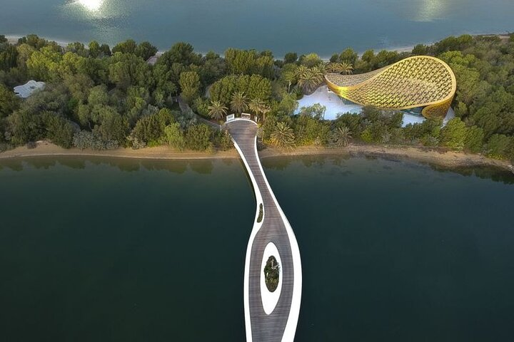 Explore the serene paths of Al Noor Island where lush gardens and modern art coexist leading to the magical Butterfly House—a delightful experience for nature and art lovers alike.